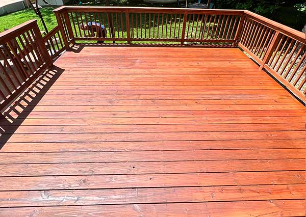 Old deck refinished with gunstock stain